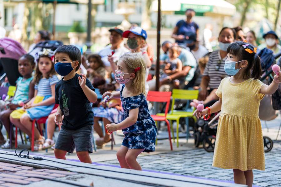 Kids jump up and down, play and dance at Camp Kids in Bryant Park New York City!