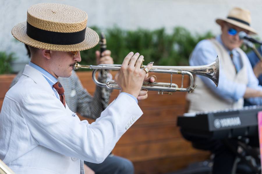Terry Waldo and his Gotham City Band play in the plaza at Moynihan Train Hall