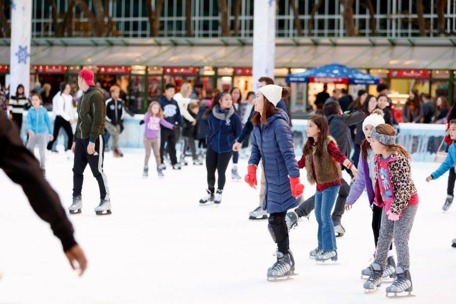 Visitors skate at The Rink at Bryant Park's Winter Village in New York City.