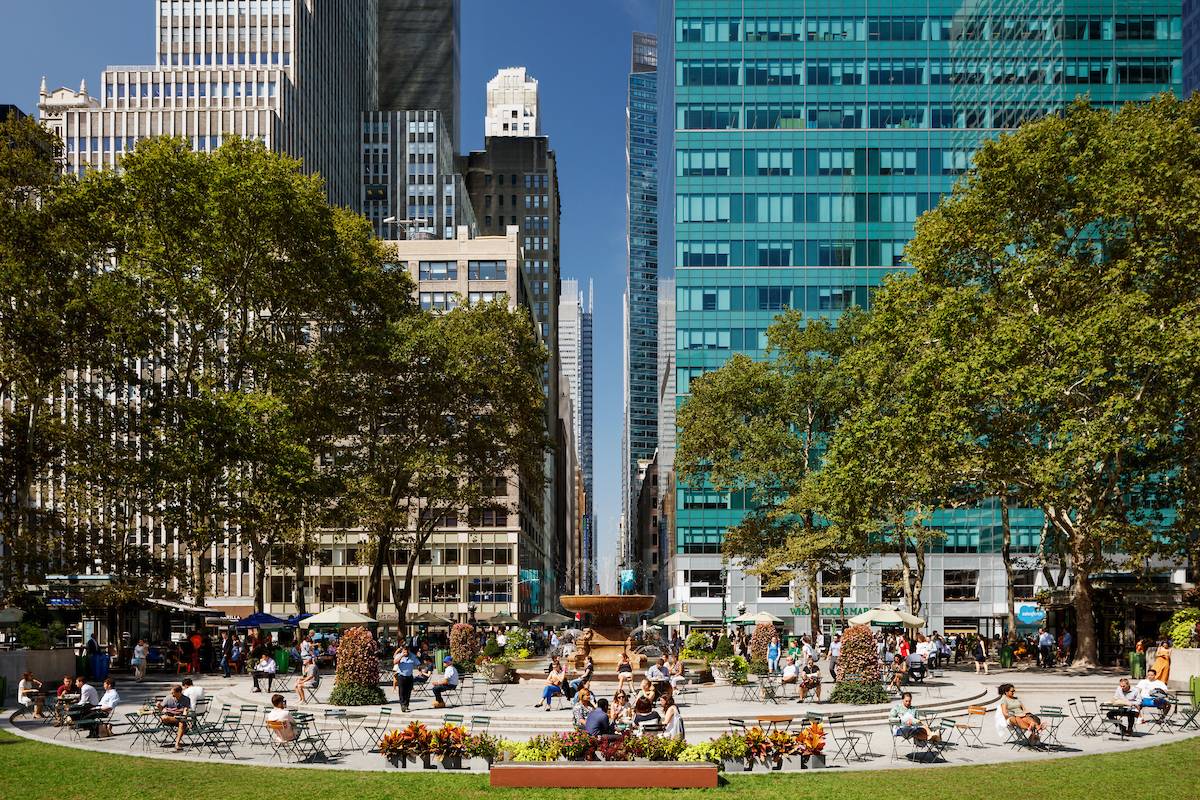 The Josephine Shaw Lowell memorial fountain in summer as viewed from the lawn at Bryant Park in New York City.